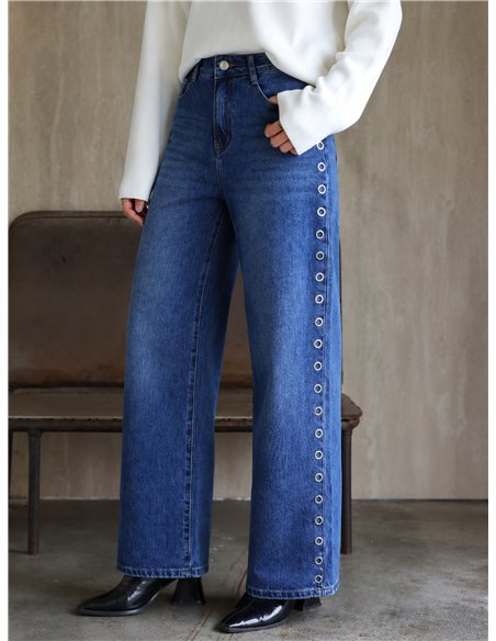 Jeans a gamba larga con occhielli laterali