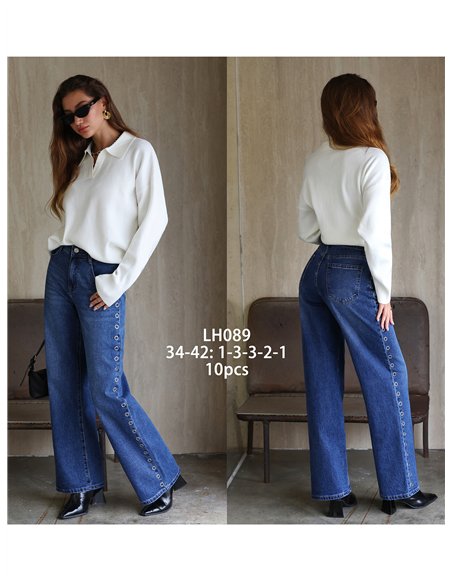 Jeans a gamba larga con occhielli laterali