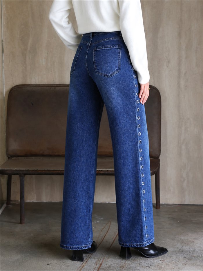 Jeans a gamba larga con occhielli laterali