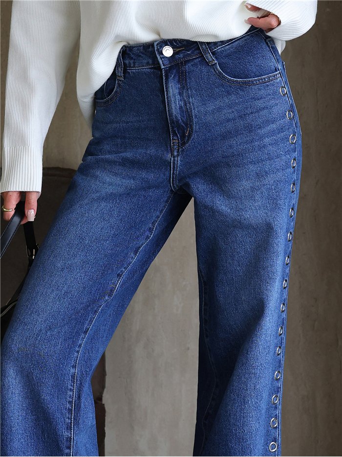 Jeans a gamba larga con occhielli laterali