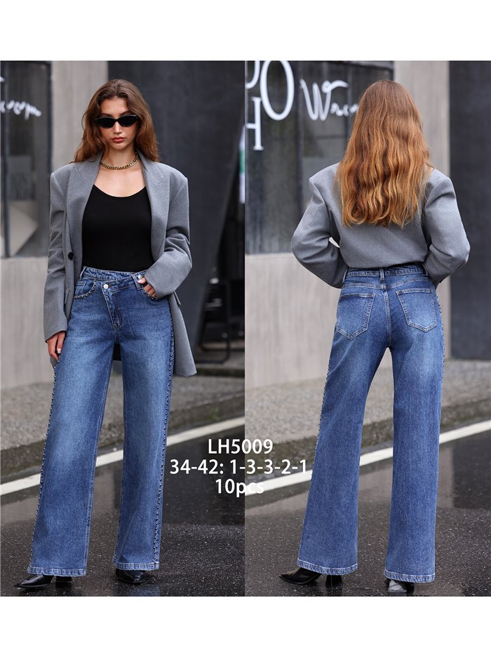 Jeans wide leg cintura cruzada tachuelas laterales