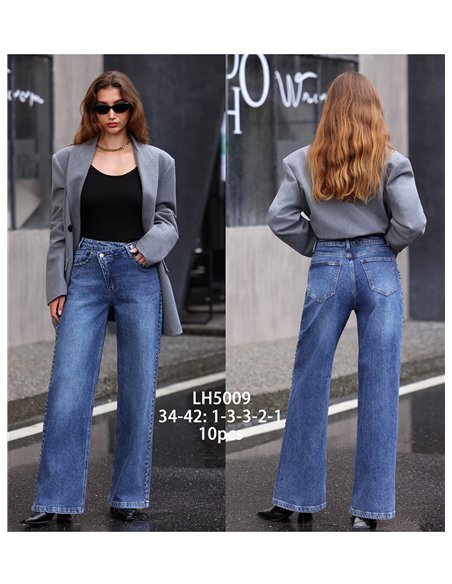 Jeans wide leg cintura cruzada tachuelas laterales