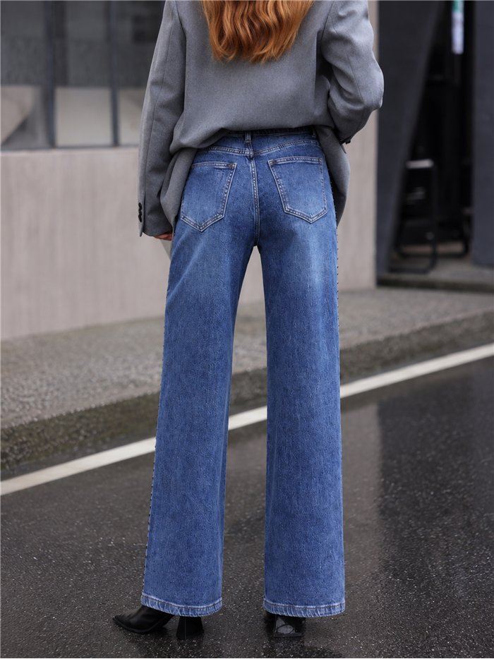 Jeans wide leg cintura cruzada tachuelas laterales