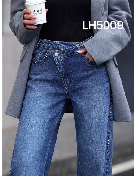 Jeans wide leg cintura cruzada tachuelas laterales