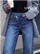 Jeans wide leg cintura cruzada tachuelas laterales