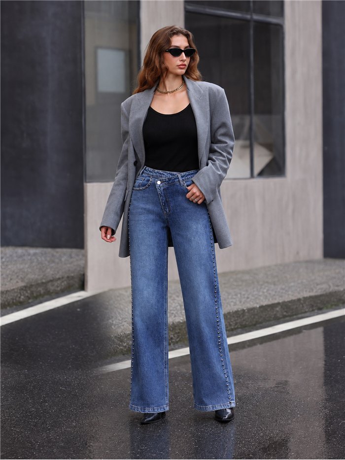 Jeans wide leg cintura cruzada tachuelas laterales