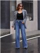 Jeans wide leg cintura cruzada tachuelas laterales