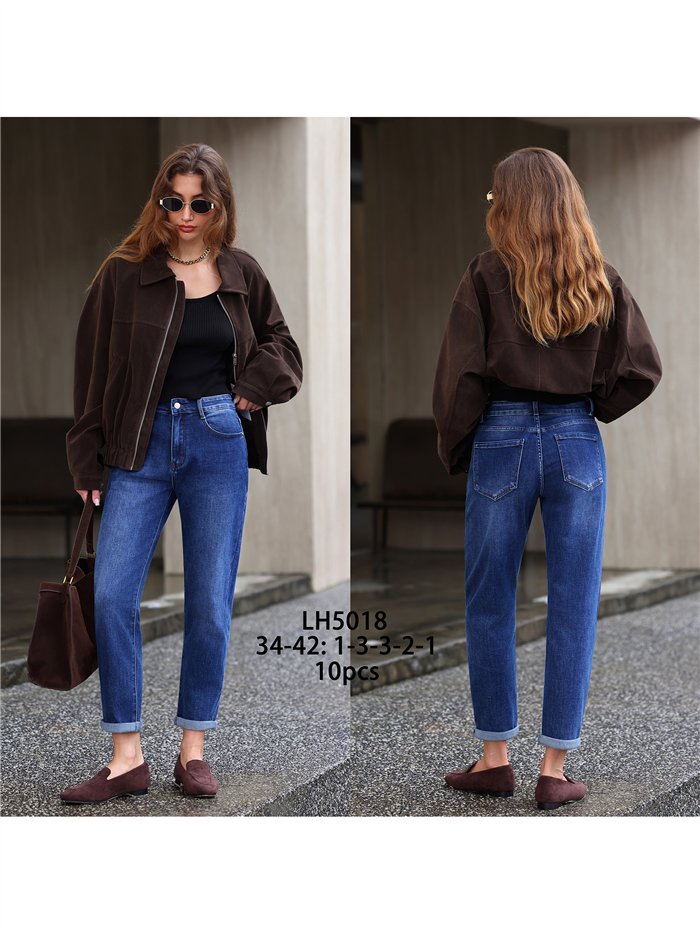 Jeans mom fit bajo vuelto