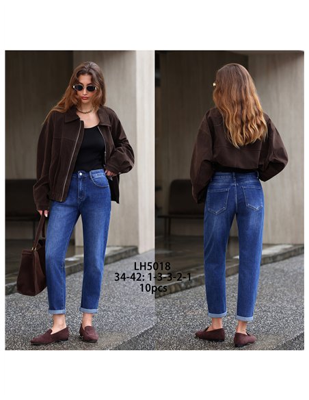 Jeans mom fit bajo vuelto