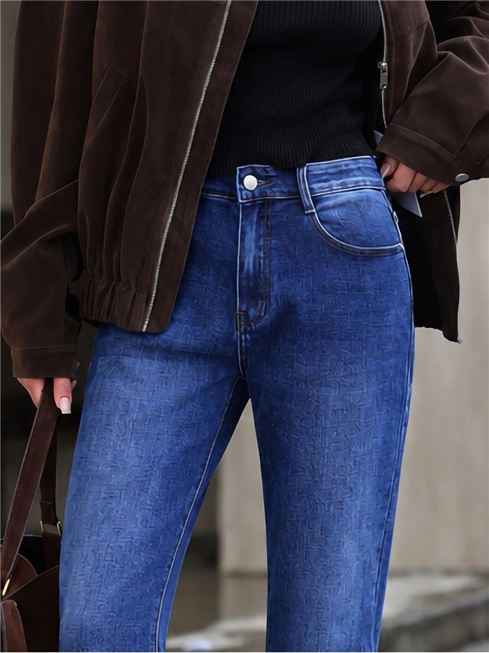 Jeans mom fit bajo vuelto