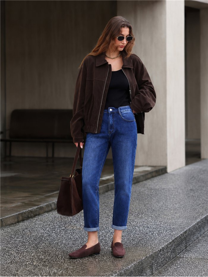 Jeans mom fit bajo vuelto