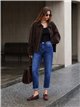 Jeans mom fit bajo vuelto