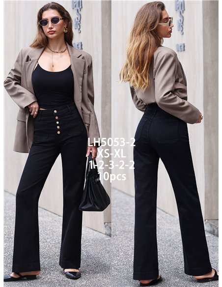 Jeans wide leg negros bolsillos parche y botones multicolor
