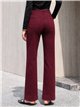 Jeans wide leg burdeos bolsillos parche y botones multicolor