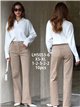 Jeans wide leg beige bolsillos parche y botones multicolor