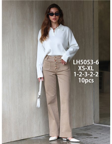 Jeans wide leg beige bolsillos parche y botones multicolor