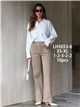 Jeans wide leg beige bolsillos parche y botones multicolor