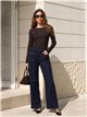 Jeans wide leg bolsillos pespunte