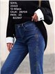 Jeans flare tachas lateral