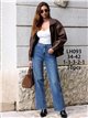 Jeans a gamba larga con borchie laterali