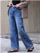 Jeans wide leg bordados de soles con tachas