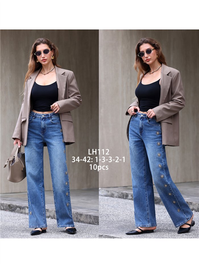 Jeans wide leg bordados de soles con tachas