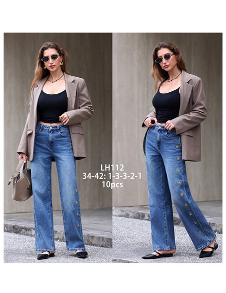Jeans wide leg bordados de soles con tachas