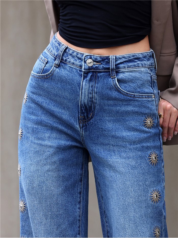 Jeans wide leg bordados de soles con tachas