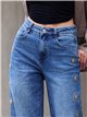 Jeans wide leg bordados de soles con tachas