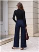 Jeans wide leg índigo bolsillos parche