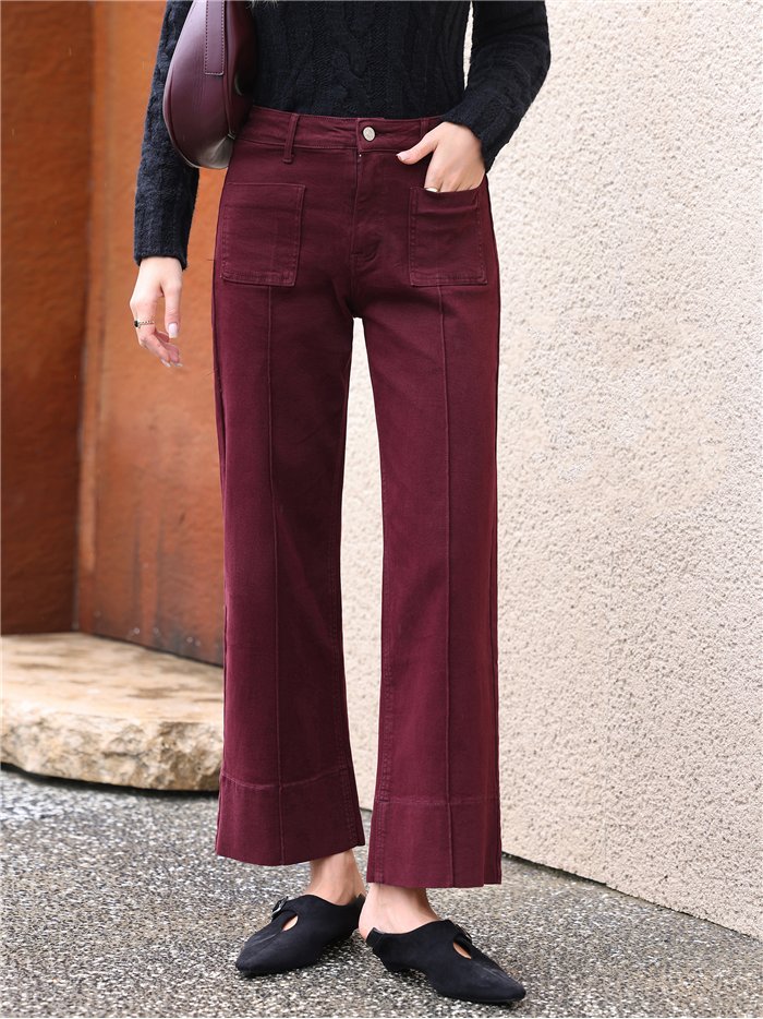 Jeans a gamba larga color vino con tasche applicate