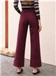 Jeans a gamba larga color vino con tasche applicate