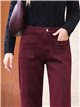 Jeans a gamba larga color vino con tasche applicate
