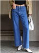 Jeans wide leg bolsillos parche