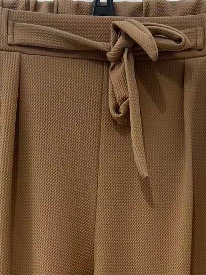 Pantalón textura con lazo talla grande