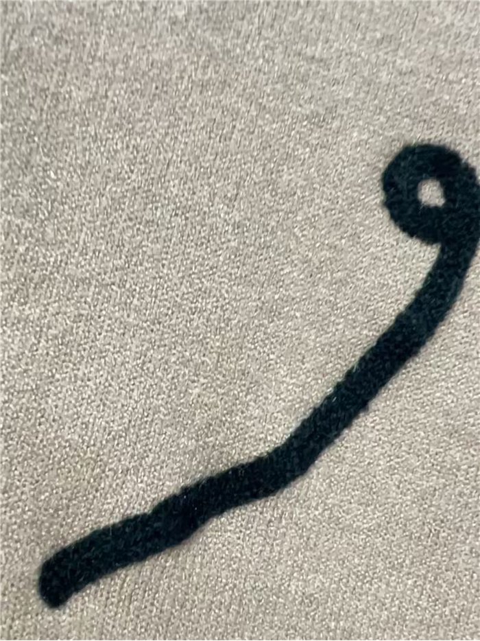 Cárdigan punto flor relieve