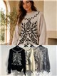 Jersey bordado cuello subido