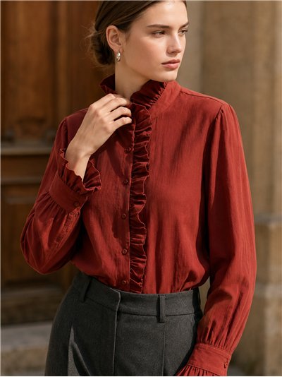 Blusa cuello alto volante