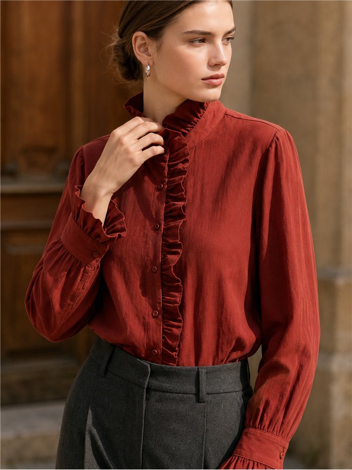 Blusa cuello alto volante