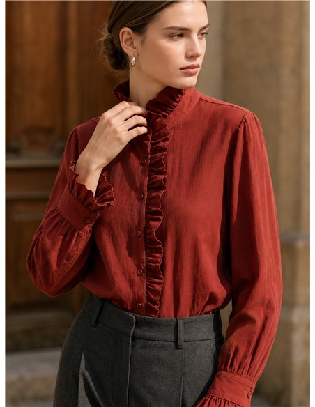Blusa cuello alto volante