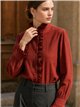 Blusa cuello alto volante