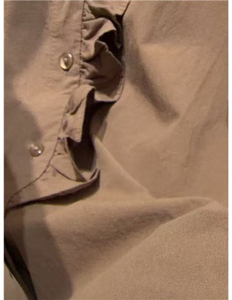 Blusa cuello alto volante