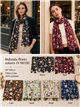 Fular floral con borlas