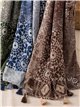Fular patchwork con borlas