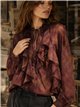 Blusa de cuadros volantes y lazada