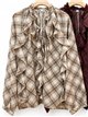 Blusa de cuadros volantes y lazada