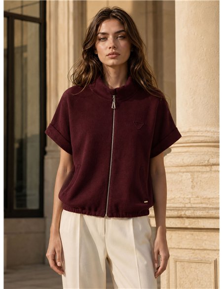 Giacca corta in maglia con collo alto
