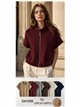 Giacca corta in maglia con collo alto