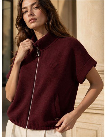 Giacca corta in maglia con collo alto