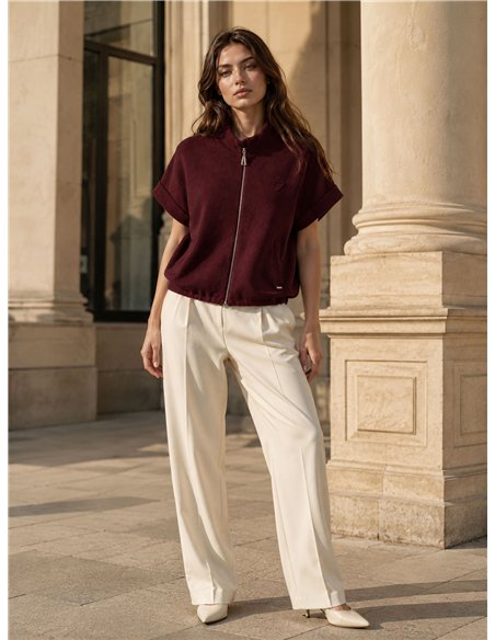 Giacca corta in maglia con collo alto